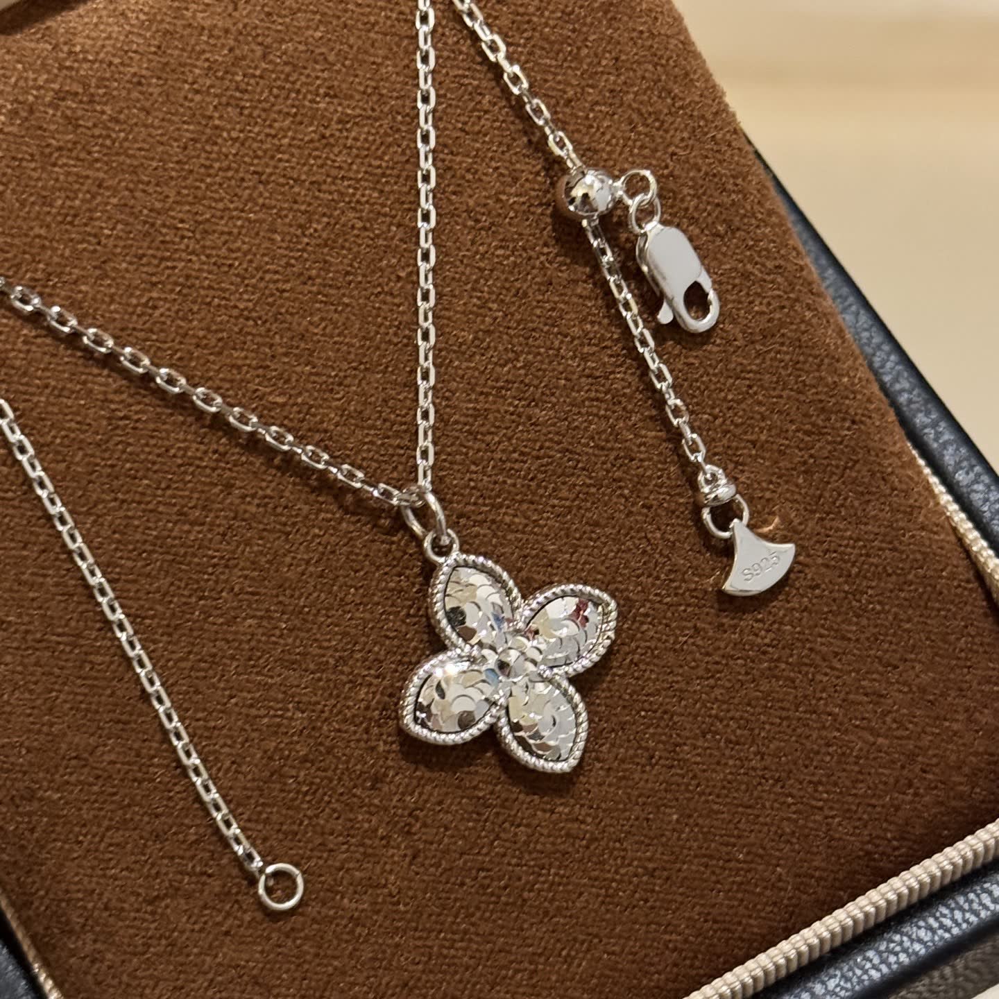 Van Cleef & Arpels Gold and Silver Flower Pendant Necklaces